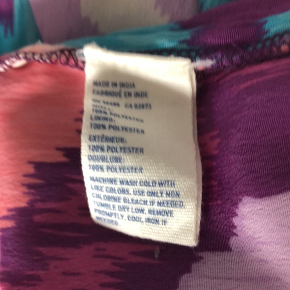 Adorable mini dress. Native pattern with spaghetti straps and front pockets! - Picture 13 of 13